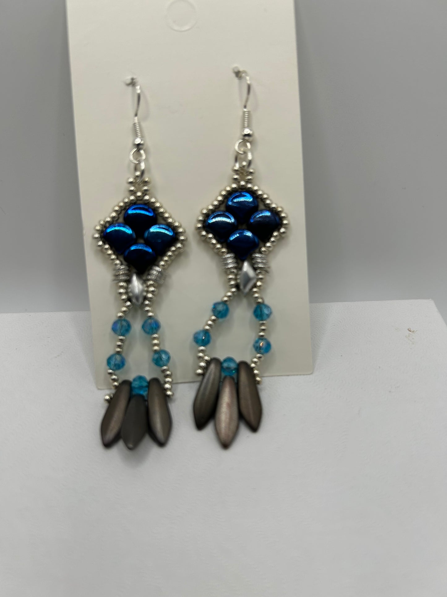 Earrings dangling different colors