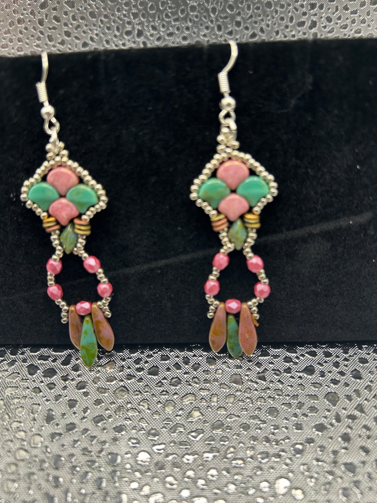 Earrings dangling different colors