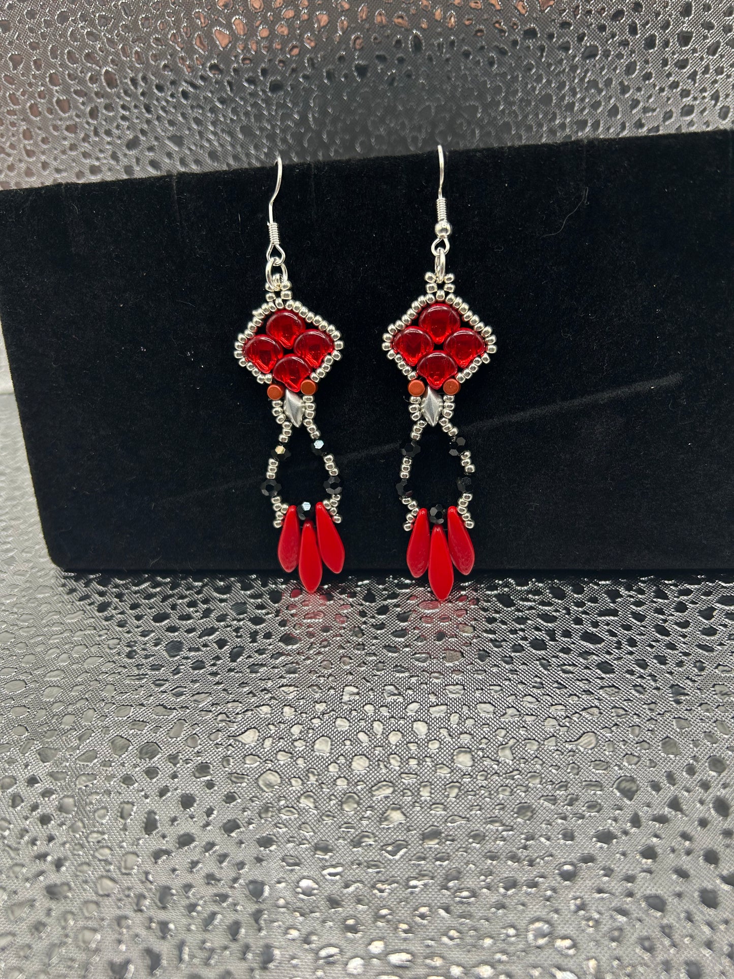 Earrings dangling different colors
