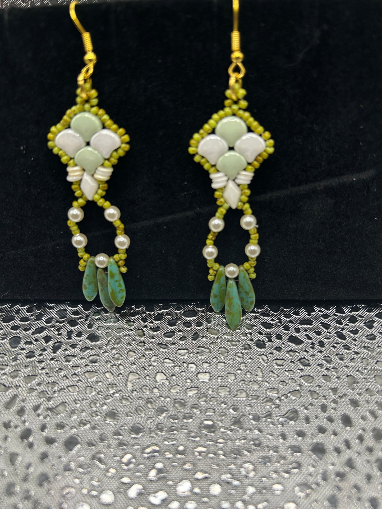 Earrings dangling different colors