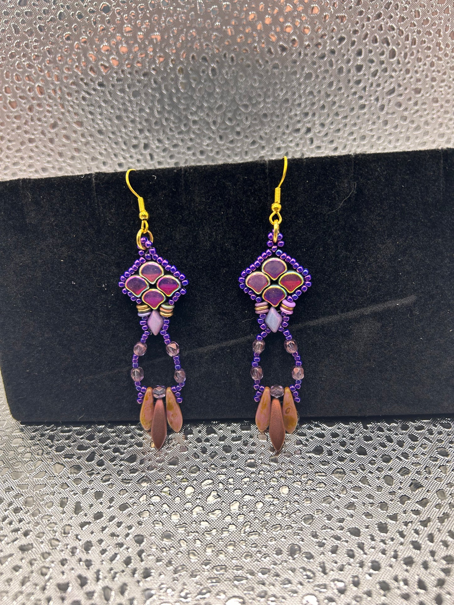 Earrings dangling different colors