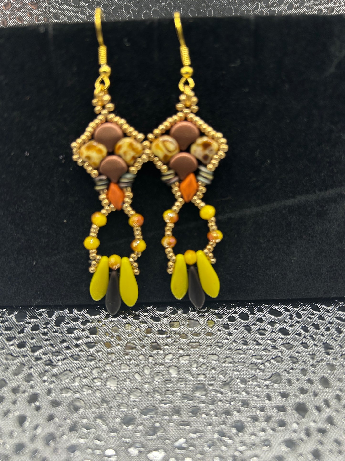 Earrings dangling different colors