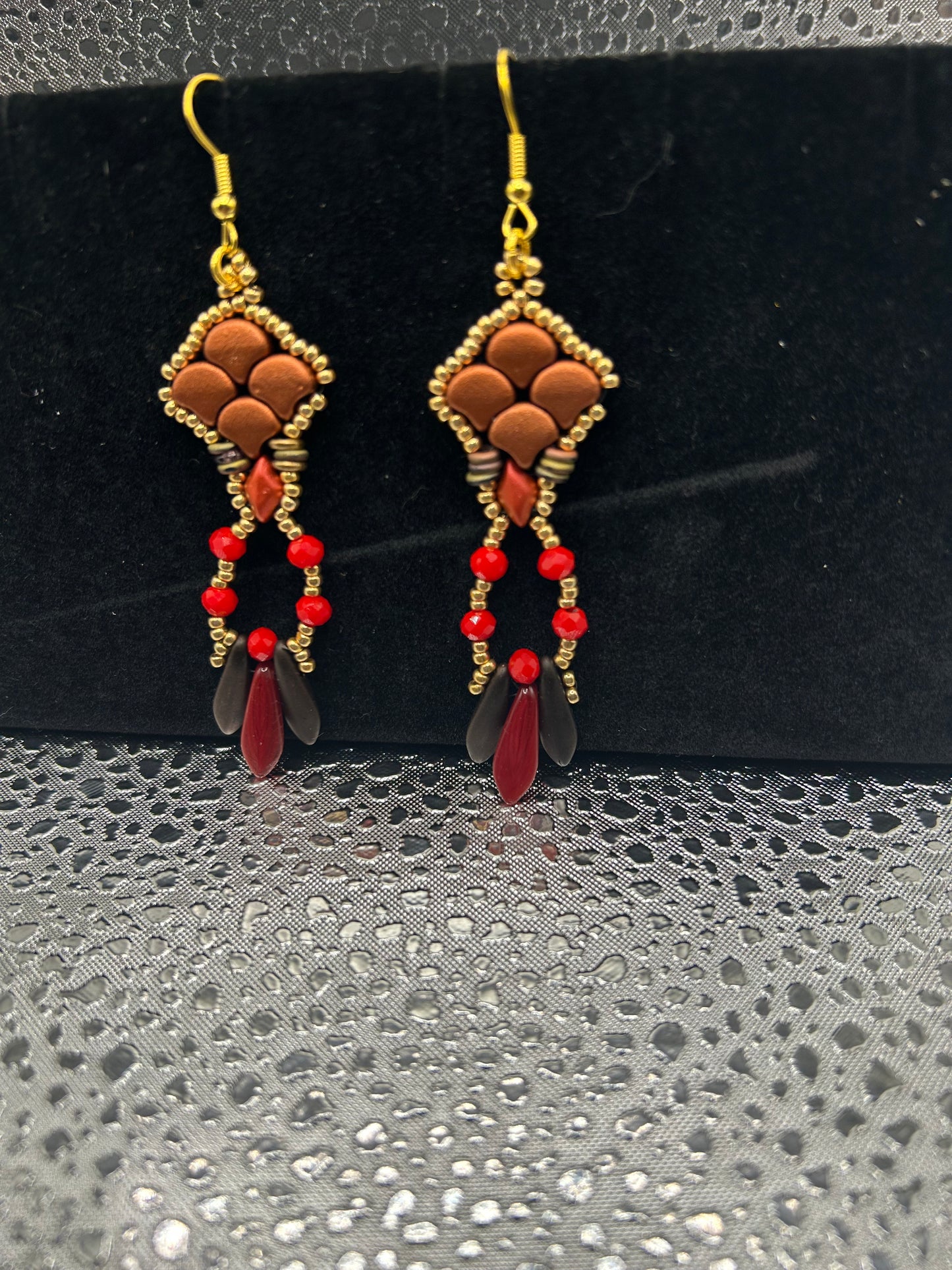 Earrings dangling different colors